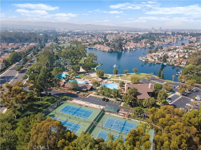aerial view of property's location with a nearby body of water
