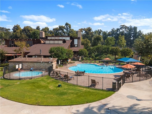 community pool featuring a patio