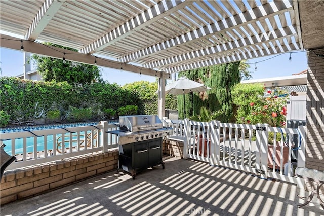 view of patio / terrace with a pergola, a pool, and fence