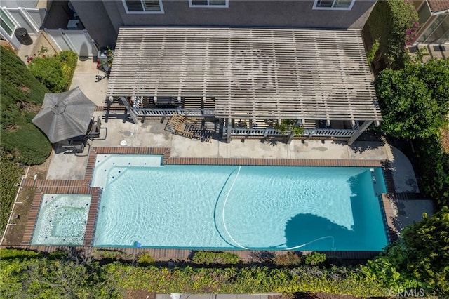 view from above of property featuring a pool