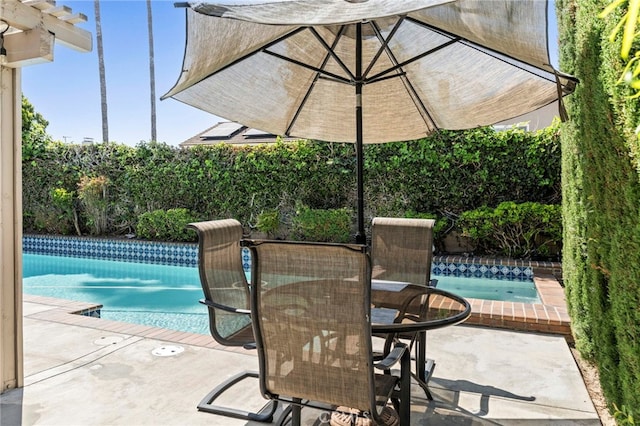 view of patio featuring outdoor dining space