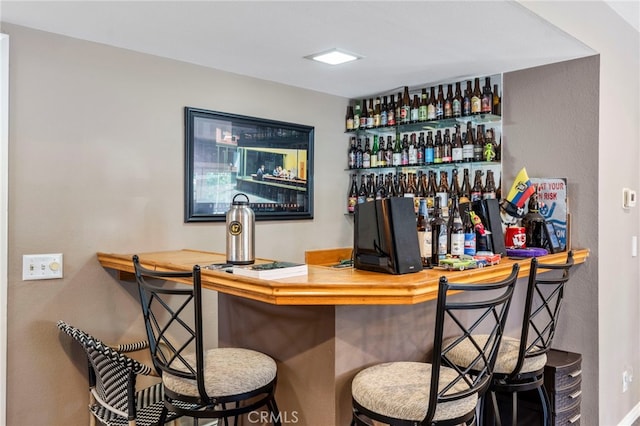 indoor dry bar with baseboards