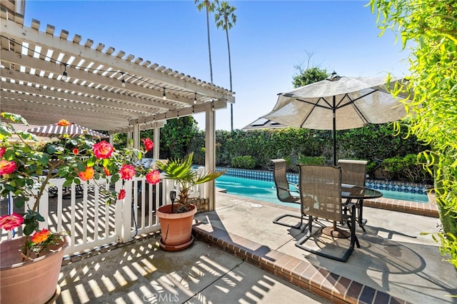 view of patio / terrace with a pergola and a fenced backyard