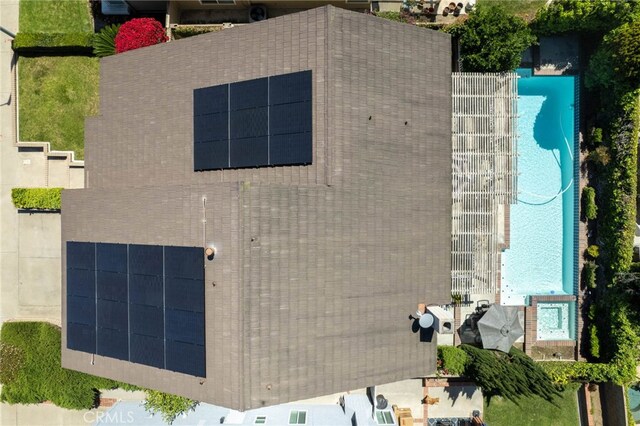 view from above of property with a pool area