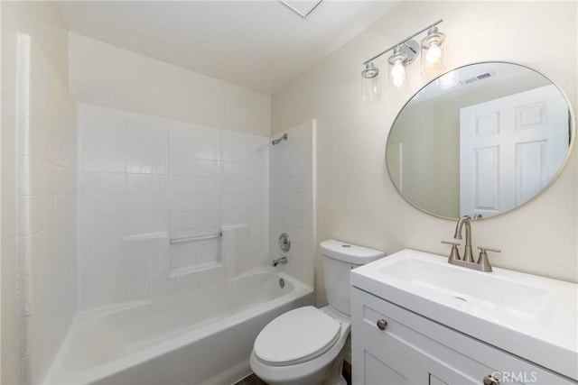 full bathroom with toilet, vanity, and shower / washtub combination