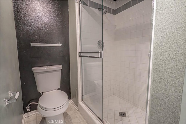 5050 Coldwater Canyon Ave Unit 306, Sherman Oaks, CA 91423 - full bath featuring toilet, a stall shower, and a textured wall
