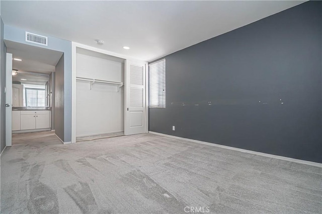 5050 Coldwater Canyon Ave Unit 306, Sherman Oaks, CA 91423 - unfurnished bedroom with light carpet, a closet, baseboards, and recessed lighting