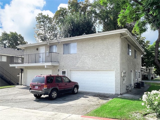 3078 Knollwood Ave, La Verne, CA 91750 - view of property with driveway, stucco siding, and a garage