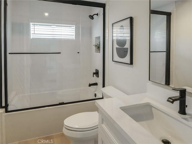 613 E Walnut Ave, Monrovia, CA 91016 - bathroom featuring vanity, shower / bath combination with glass door, and toilet