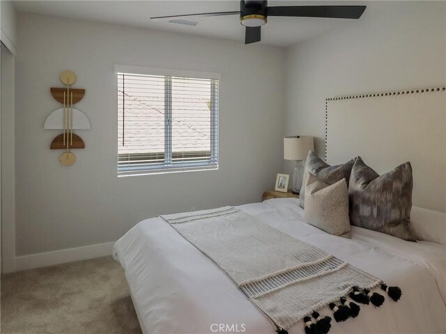 613 E Walnut Ave, Monrovia, CA 91016 - carpeted bedroom featuring a ceiling fan and baseboards