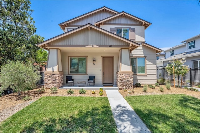613 E Walnut Ave, Monrovia, CA 91016 - craftsman-style home with stone siding and a porch