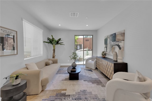 613 E Walnut Ave, Monrovia, CA 91016 - living room featuring wood finished floors and recessed lighting