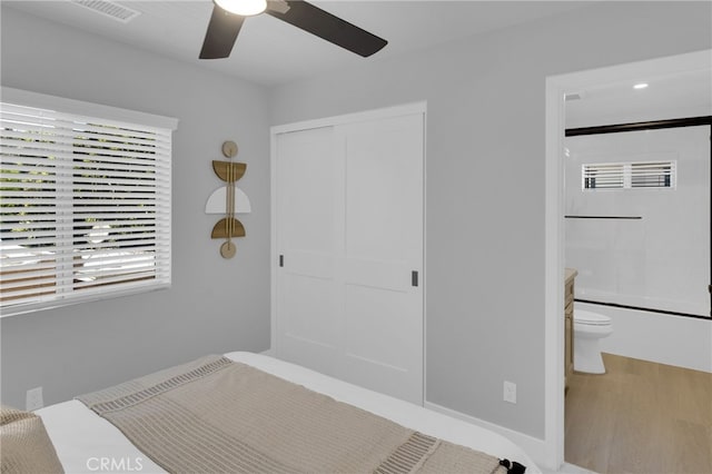 613 E Walnut Ave, Monrovia, CA 91016 - unfurnished bedroom with wood finished floors, a closet, ensuite bathroom, and a ceiling fan
