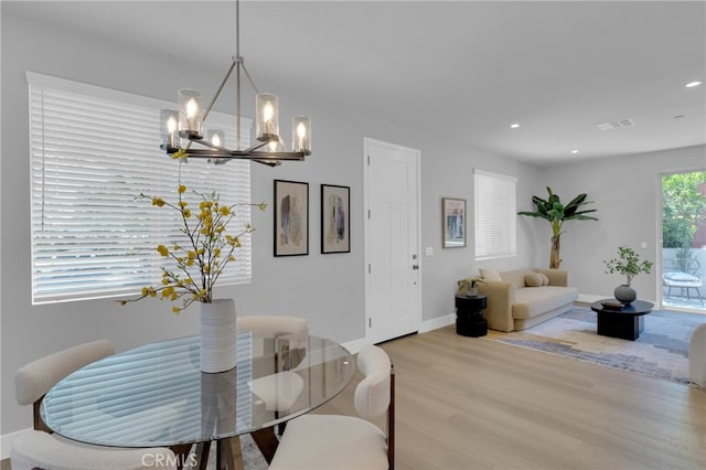 613 E Walnut Ave, Monrovia, CA 91016 - dining space featuring a chandelier, wood finished floors, and recessed lighting