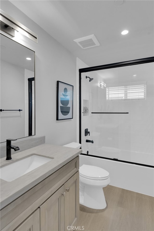 613 E Walnut Ave, Monrovia, CA 91016 - bathroom featuring vanity, enclosed tub / shower combo, and recessed lighting