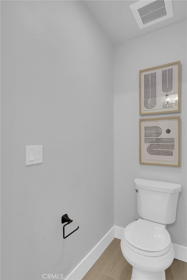 613 E Walnut Ave, Monrovia, CA 91016 - bathroom featuring baseboards and wood finished floors