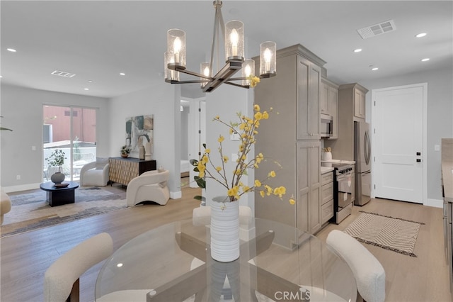 613 E Walnut Ave, Monrovia, CA 91016 - dining area with light wood finished floors, a chandelier, and recessed lighting