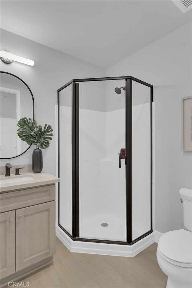 613 E Walnut Ave, Monrovia, CA 91016 - bathroom with a shower stall, vanity, and wood finished floors