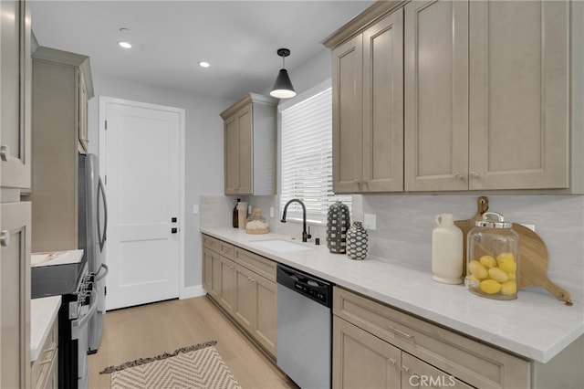 613 E Walnut Ave, Monrovia, CA 91016 - kitchen featuring stainless steel appliances, light wood-type flooring, light countertops, recessed lighting, and decorative light fixtures