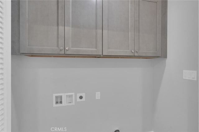 613 E Walnut Ave, Monrovia, CA 91016 - washroom featuring electric dryer hookup, washer hookup, and cabinet space