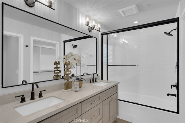 613 E Walnut Ave, Monrovia, CA 91016 - bathroom featuring combined bath / shower with glass door and double vanity