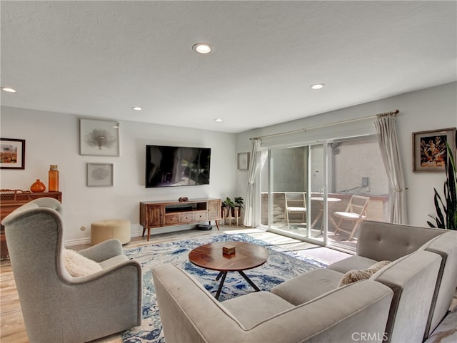 6587 E Via Fresco, Anaheim Hills, CA 92807 - living room with wood finished floors, recessed lighting, and baseboards