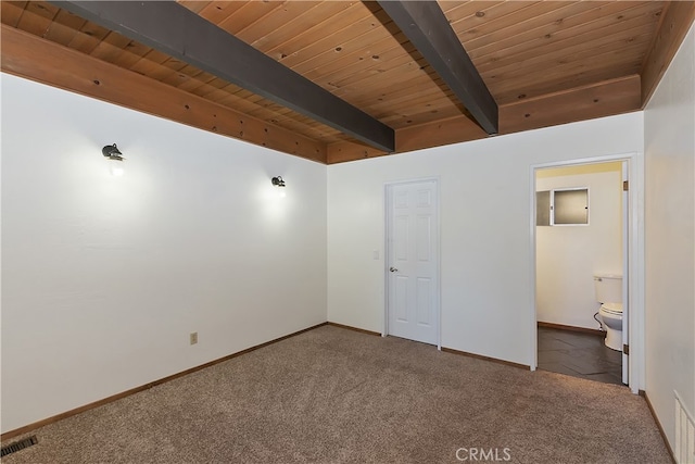 859 Poe Ct, Lake Arrowhead, CA 92352 - unfurnished bedroom with beamed ceiling, carpet floors, wood ceiling, baseboards, and ensuite bathroom