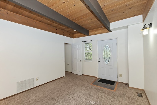 859 Poe Ct, Lake Arrowhead, CA 92352 - carpeted foyer entrance featuring beamed ceiling, wood ceiling, and baseboards