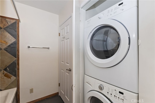 859 Poe Ct, Lake Arrowhead, CA 92352 - washroom featuring stacked washing machine and dryer and baseboards