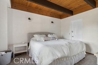 859 Poe Ct, Lake Arrowhead, CA 92352 - bedroom with wooden ceiling with exposed beams and carpet floors