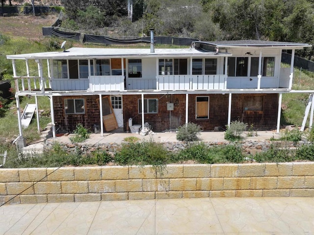 9703 Upas Ln, Escondido, CA 92029 - rear view of property featuring a sunroom and a patio