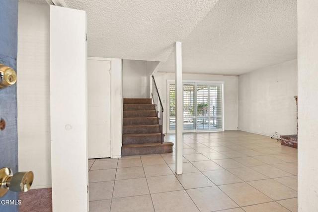 2575 Gayle Pl, Simi Valley, CA 93065 - staircase with a textured ceiling and tile patterned flooring