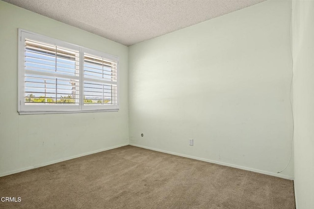 2575 Gayle Pl, Simi Valley, CA 93065 - spare room with carpet, a textured ceiling, and baseboards