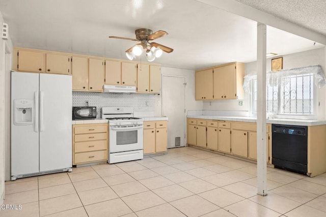 2575 Gayle Pl, Simi Valley, CA 93065 - kitchen featuring black appliances, under cabinet range hood, tile counters, a ceiling fan, and backsplash