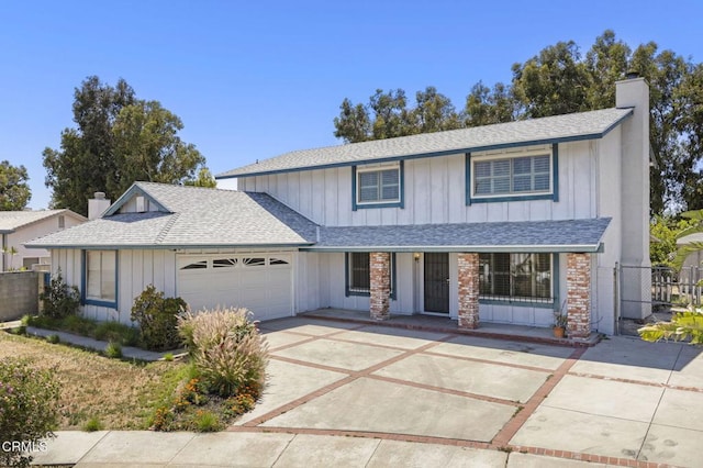 2575 Gayle Pl, Simi Valley, CA 93065 - traditional-style home with a chimney, a shingled roof, and an attached garage