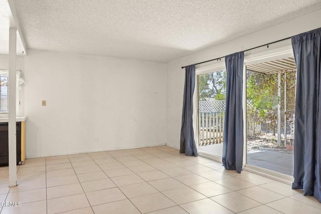2575 Gayle Pl, Simi Valley, CA 93065 - empty room with a textured ceiling and light tile patterned floors