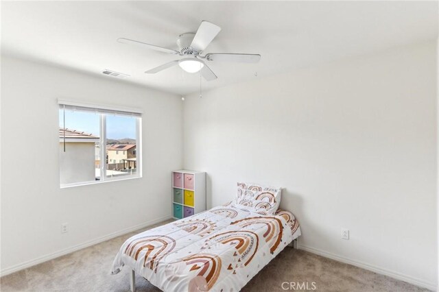 29586 Bisbee Ct, Winchester, CA 92596 - carpeted bedroom with baseboards and a ceiling fan