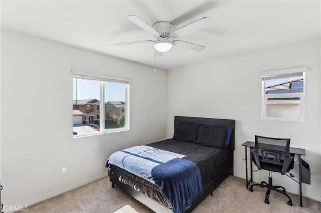 29586 Bisbee Ct, Winchester, CA 92596 - carpeted bedroom with multiple windows, baseboards, and ceiling fan