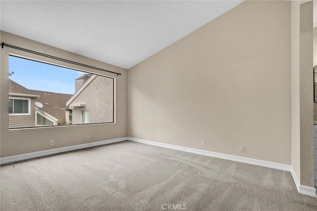 401 Deerfield Ave Unit 84, Irvine, CA 92606 - carpeted spare room with baseboards and lofted ceiling