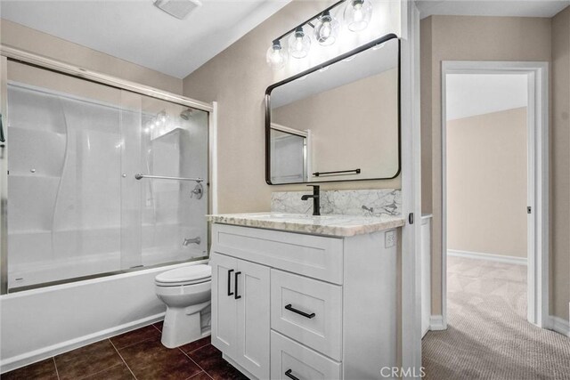 401 Deerfield Ave Unit 84, Irvine, CA 92606 - full bath featuring vanity, toilet, enclosed tub / shower combo, and tile patterned flooring