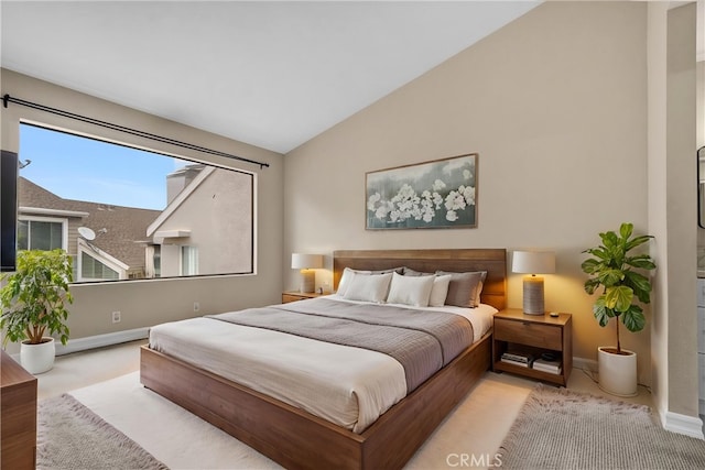 401 Deerfield Ave Unit 84, Irvine, CA 92606 - bedroom featuring baseboards, vaulted ceiling, and carpet floors