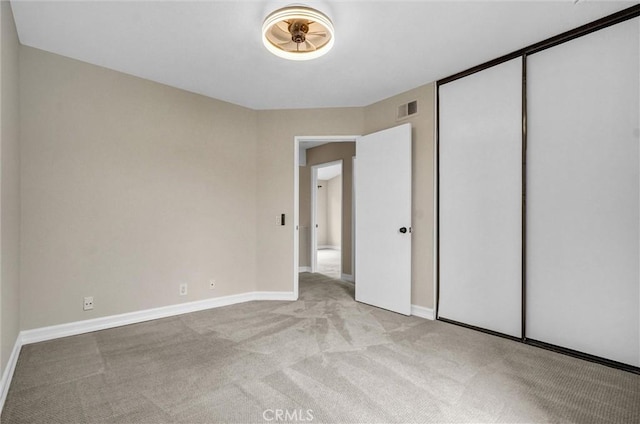 401 Deerfield Ave Unit 84, Irvine, CA 92606 - unfurnished bedroom featuring carpet flooring, baseboards, and a closet