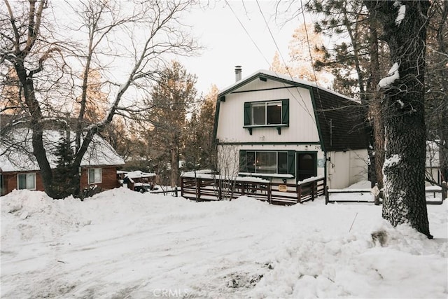 753 Maple Ln, Sugarloaf, CA 92386 - snow covered house with a chimney