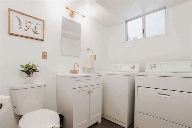 753 Maple Ln, Sugarloaf, CA 92386 - bathroom featuring separate washer and dryer, toilet, and vanity