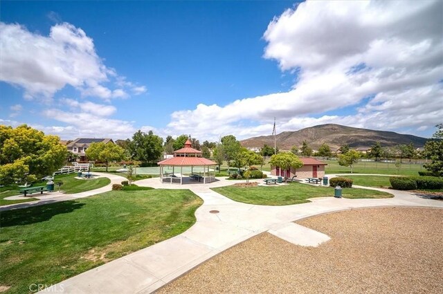 32804 Red Carriage Rd, Winchester, CA 92596 - surrounding community featuring a gazebo, a mountain view, and a lawn