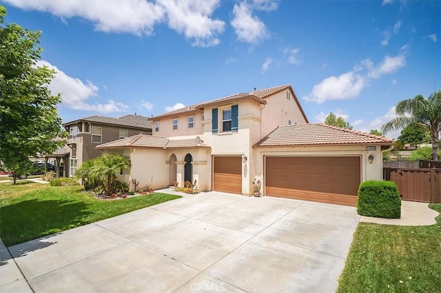32804 Red Carriage Rd, Winchester, CA 92596 - mediterranean / spanish house with stucco siding, concrete driveway, a tile roof, and an attached garage