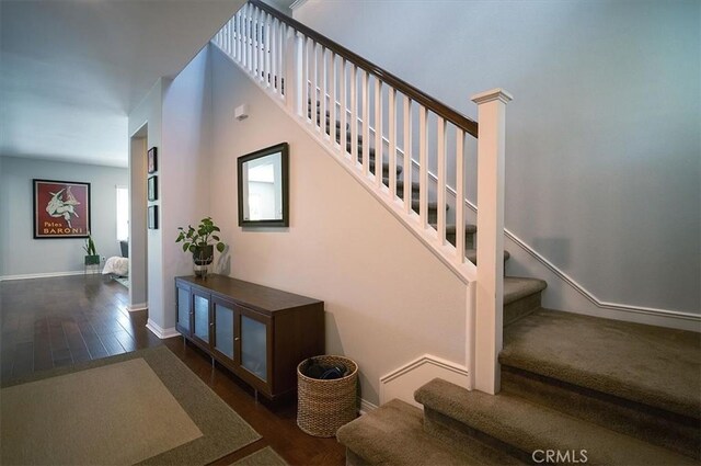 32804 Red Carriage Rd, Winchester, CA 92596 - stairway with wood finished floors and baseboards