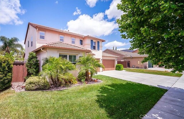 32804 Red Carriage Rd, Winchester, CA 92596 - mediterranean / spanish-style house with concrete driveway, stucco siding, a garage, and a tiled roof