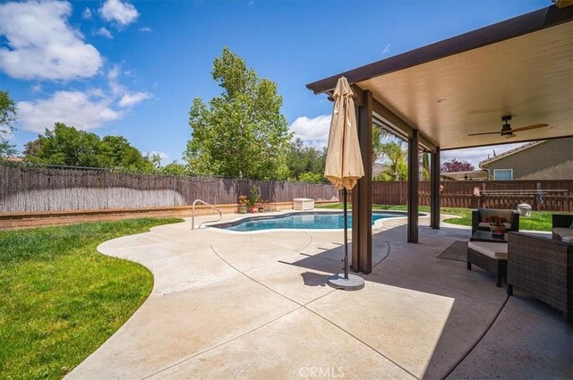 32804 Red Carriage Rd, Winchester, CA 92596 - view of swimming pool featuring a patio, a fenced backyard, and a ceiling fan