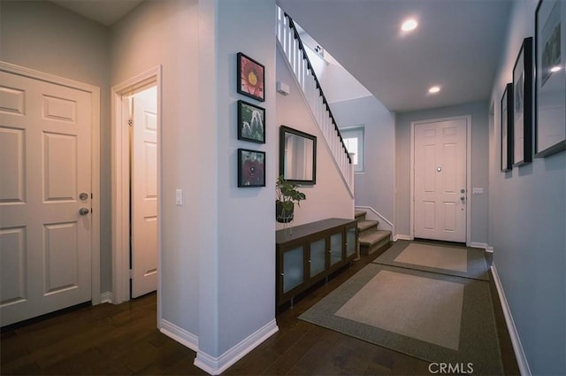 32804 Red Carriage Rd, Winchester, CA 92596 - hall featuring baseboards, dark wood-style flooring, stairs, and recessed lighting